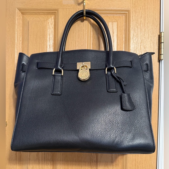 Black Leather Handbag with Gold Accents - Picture 1 of 6